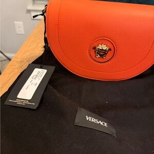 Versace Half-Moon La Medusa Vitello Leather orange crossbody handbag